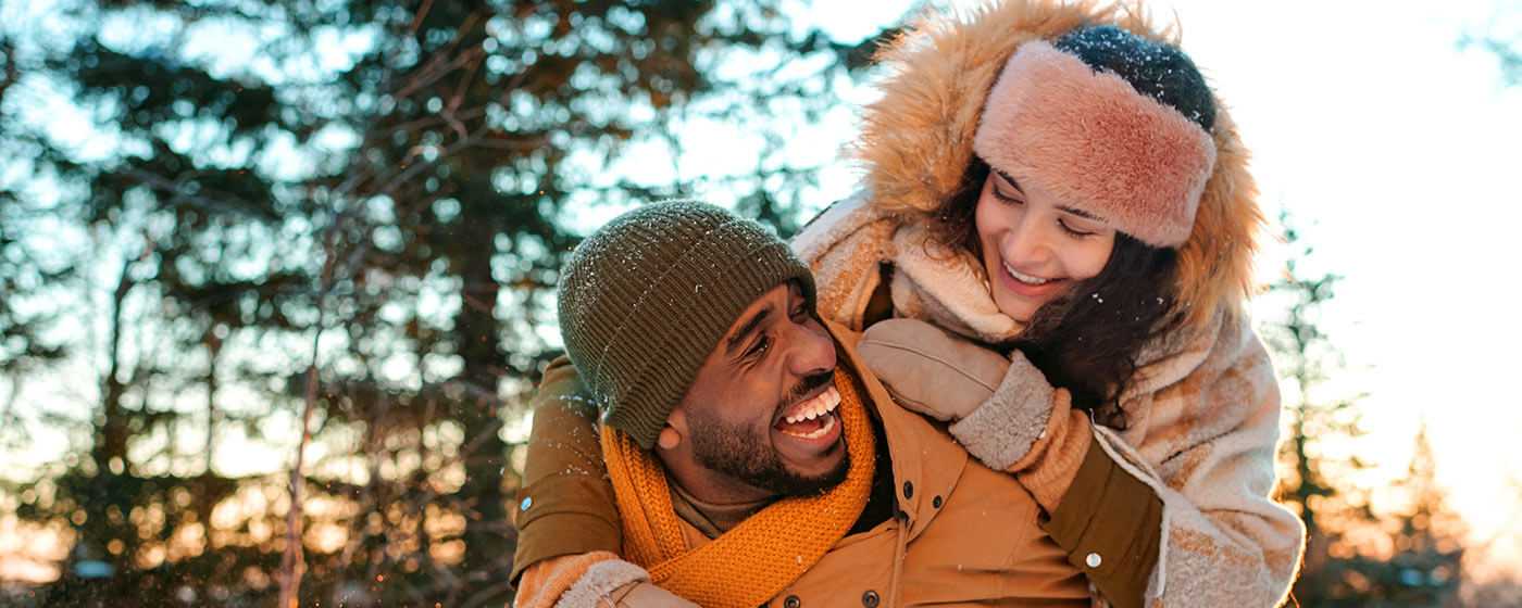 Couple enjoying winter weather outside